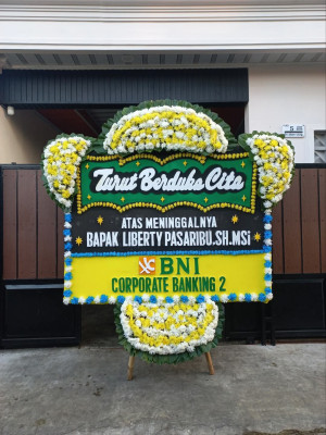 Papan Bunga Duka di Yigi