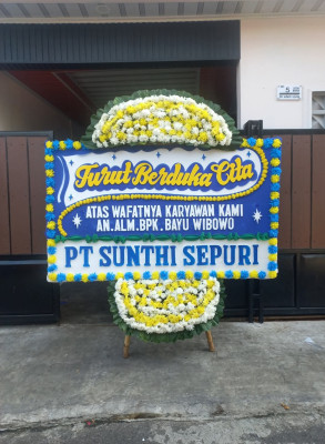 Papan Bunga Duka di Yigi