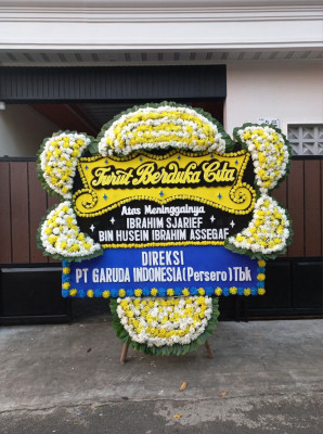 Papan Bunga Duka di Yigi
