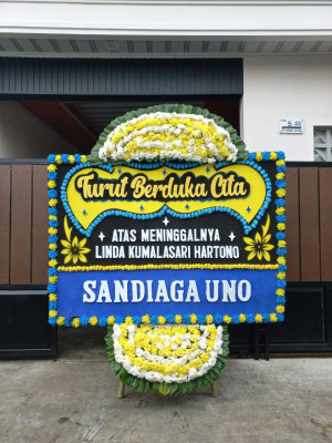 Papan Bunga Duka di Yigi