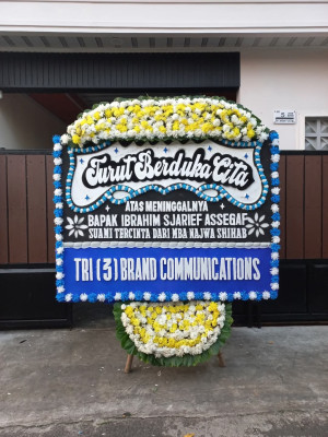 Papan Bunga Duka di Yigi